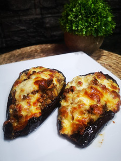 Una foto de BERENJENAS RELLENAS 🍆