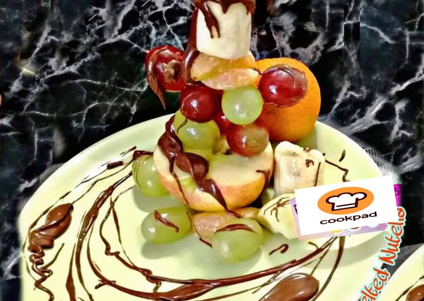 Snowman fruit skewer with melted nutella