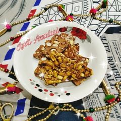 A picture of Peanuts jaggery (Gur) ki chikki.