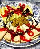 Lonchas vegetarianas a las hierbas mediterráneas, lonchas de espárragos con salsa