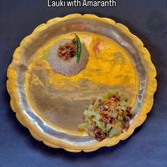 A picture of Lauki with Amaranth leaves.