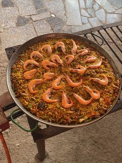 Una foto de Paella