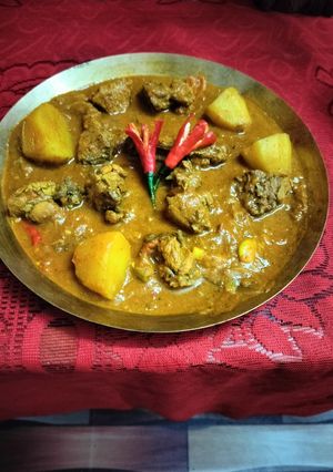A picture of Tomato Chicken Curry.
