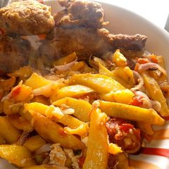 Sauteed potatoes with crispy chicken A picture of Sauteed potatoes with crispy chicken.