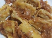 Una foto di ravioli del plin