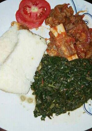 A picture of Wet Fry Beef, Ugali and Sauted Kales.