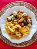 Pollo Arvejado con papitas fritas