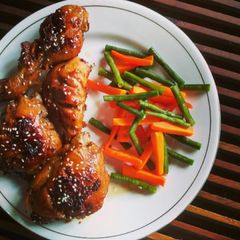 A picture of Honey Glazed Garlic Chicken with steamed veggies.