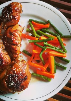 A picture of Honey Glazed Garlic Chicken with steamed veggies.