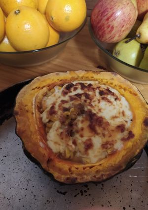 Una foto de Calabaza rellena de choclo y queso