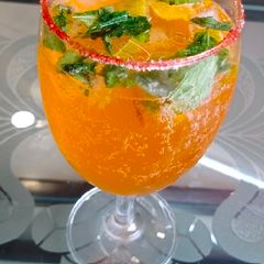 A picture of Orange lemon mojito.