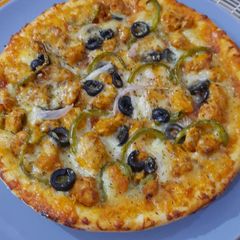 Chicken Tikka Pizza A picture of Chicken Tikka Pizza.