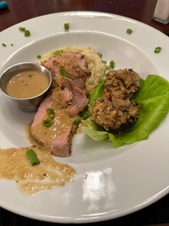 A picture of Pork Tenderloin with Spicy Mustard Horseradish Sauce.