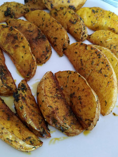 Una foto de Patatas Gajo al curry (horno)