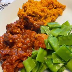 A picture of West Indian Pork Curry With Sweet Potatoes.