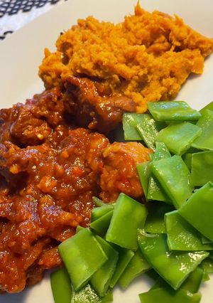 A picture of West Indian Pork Curry With Sweet Potatoes.