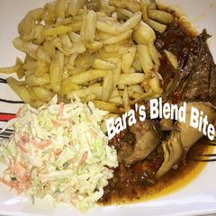 A picture of Peppered soup Chips and Salad.