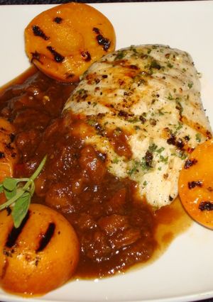 A picture of Grilled chicken breast with balsamic apricot sauce.