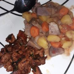 A picture of Arrowroots potatoes stew with dry fried pork.