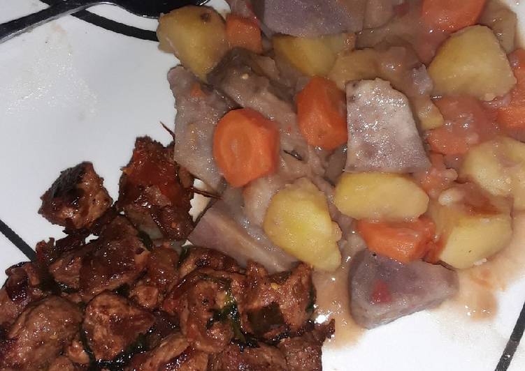 Arrowroots potatoes stew with dry fried pork