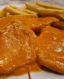 Filetes de lomo de cerdo en salsa de pimientos del piquillo