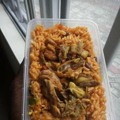 A picture of Jollof rice with Chicken.