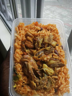A picture of Jollof rice with Chicken.