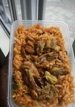 A picture of Jollof rice with Chicken.
