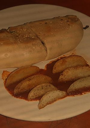 Una foto de Rollo de chile poblano hojaldrado