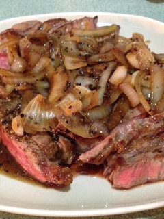 A picture of Beef Steak with Black Pepper Sauce.