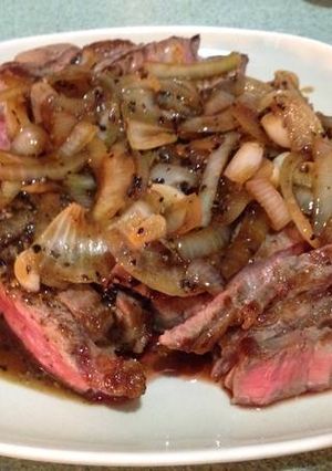 A picture of Beef Steak with Black Pepper Sauce.