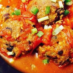 A picture of Meatballs with Tomato Sauce.