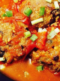 A picture of Meatballs with Tomato Sauce.