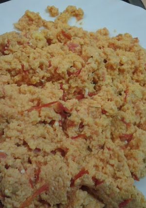 Una foto de Revuelto de tomate y cebolla