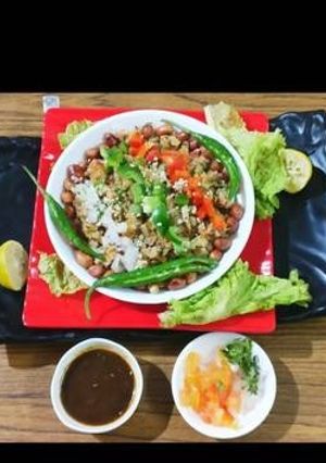 A picture of Quinoa & sama rice khichdi with veg bowl.