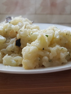 Una foto de Coliflor con ajo y perejil