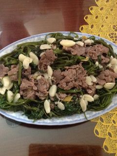 Hình của món Thịt trâu xào rau muống.