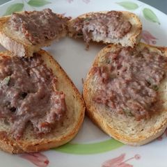 A picture of Sausage and sage bruschette.