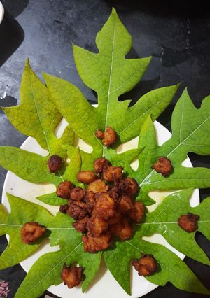 पपईचे गुलगुले (बोँड) (papai bonda recipe in marathi) रेसिपी चे मुख्य फोटो 