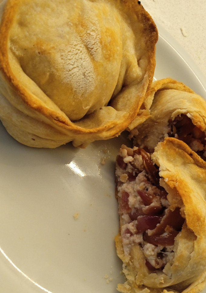 Una foto de Empanadas de ricota y cebolla