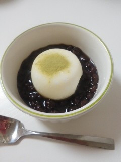 A picture of Mochi Ice Cream with Warm Sweet Red Bean Soup.