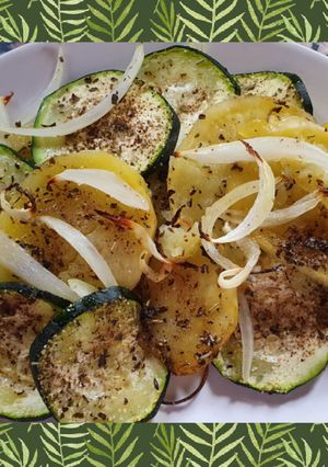 Una foto de Patatas y calabacín al horno