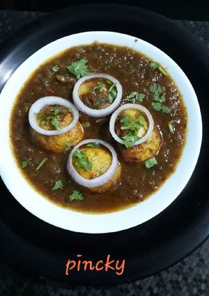 A picture of Egg curry spicy.