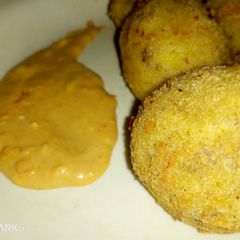 A picture of Beef yam balls and garlic dipping sauce.