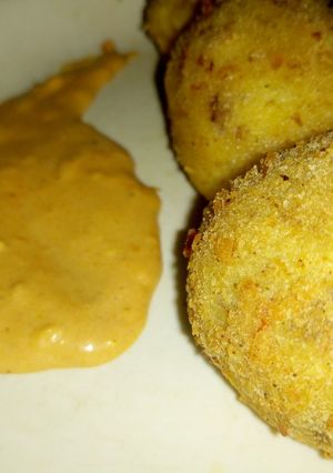 A picture of Beef yam balls and garlic dipping sauce.