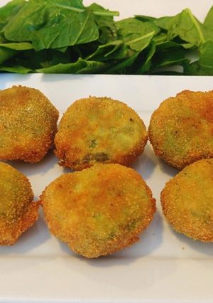 Una foto de Nuggets de pollo con espinacas