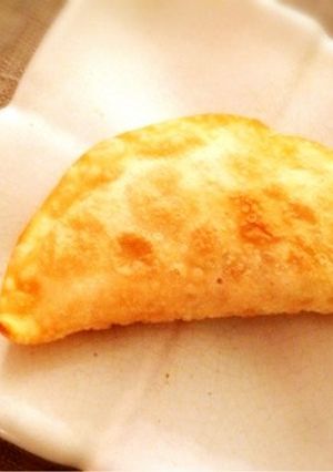 A picture of Crispy Fried Gyoza with Natto and Cheese.
