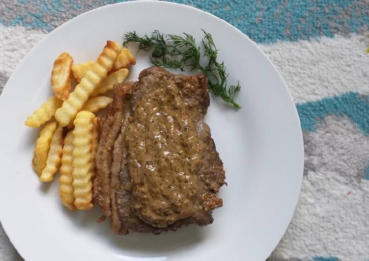 Langkah Mudah untuk Menyiapkan Ribs Steak with Perpercorn Sauce yang Lezat