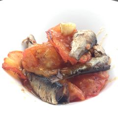 A picture of Baked Tomato And Garlic With Smoked Kieler Sprat.