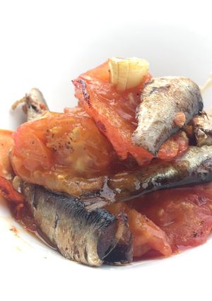 A picture of Baked Tomato And Garlic With Smoked Kieler Sprat.